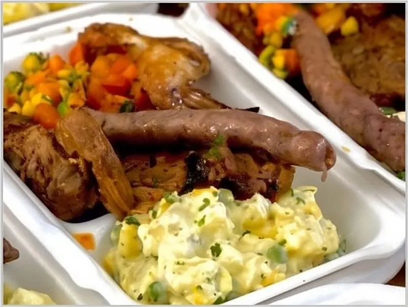 Grilled sausage with pap and salad