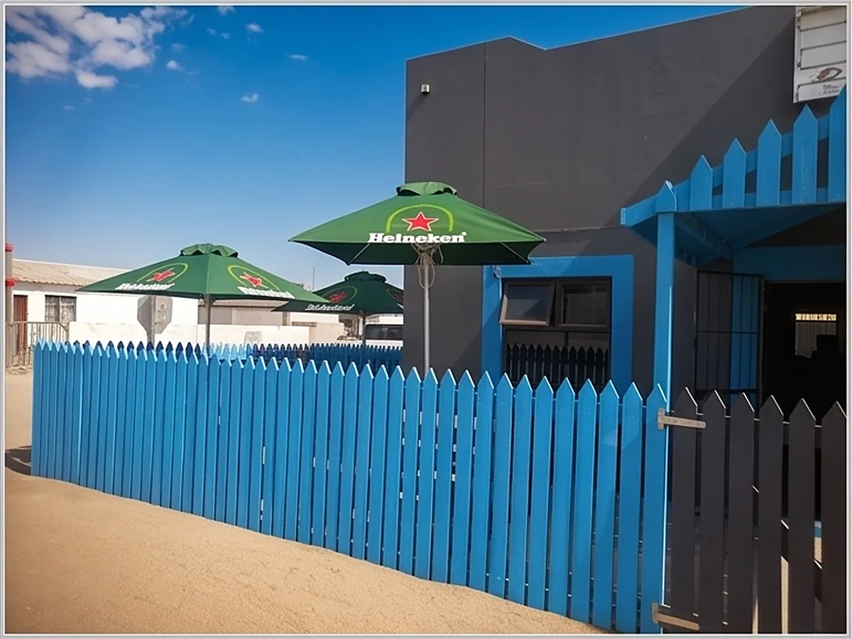 The C4 patio with its blue fence and umbrellas